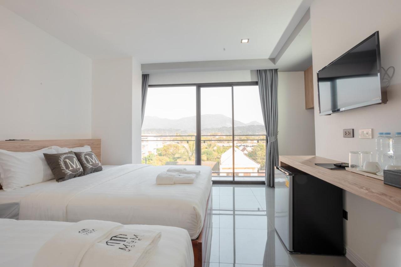 M&M Hotel Vang Vieng Bagian luar foto